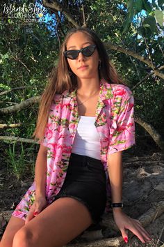 WOMENS CUT RAYON HAWAIIAN SHIRT - Can be easily paired with your favourite wardrobe staples. Perfect for a music festival, beach party, Aloha Friday or casual wear. Features and open neck collar, coconut buttons, short sleeves with a turned-up cuff with button detail. Matching items for the whole family available! #hawaiianshirt #partyshirt #alohashirt #festivalshirt #uniforms #alohafriday #pinkflamingo #flamingoclothing #ladieshawaiianshirt #party #hawaiianthemed #flamingoshirt #womens #shirt Tropical Shirts Women, Hawaiian Festival Outfit, Aloha Shirt Outfit Women, Hawaiian Shirts For Women, Modern Hawaiian Outfit, Aloha Outfit Ideas For Women, Tropical Shirt Outfit Women, Hawian Shirt Outfits, Hawaiian Outfit Women Party Hawaii