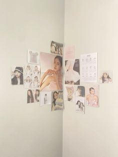 a white wall with many pictures on it