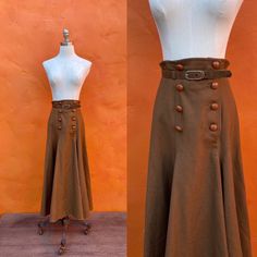 "Amazing skirt! Brown wool lined belted leather buttons Tag:Boutique by Elegance,S.A. Paris EUC Waist: 25.5\" Hip: 49\" Length: 35\"" Fitted Vintage Skirt For Vintage Fashion, Retro Fitted Skirt With Buttons, Fitted Vintage Mini Skirt, Vintage Formal Bottoms With Buttons, Vintage Brown Skirt With Buttons, Retro Fitted Skirt With Button Closure, Retro Fitted Skirt With Belt Loops, Brown Fitted Full Length Skirt, Retro Brown Skirt With Button Closure