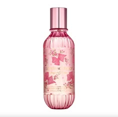 LoveShackFancy Sugar Blush Body & Hair Perfume Mist Fruity Floral Scent (8 oz) Fragrance Family:  Florals Scent Type:  Fruity Florals Key Notes:  Passion Fruit, Pink Rose, Pink Sugar Fragrance Description: A fruity floral body mist that smells like dessert.  This delicious scent gets its sweetness from a pink vanilla sugar note spun with creamy rose, tart passion fruit, violet, and sandalwood. About the Bottle:  A slim, fluted mist that adds a fanciful edge to your everyday spray.  This one is all about pink bows, pink roses, and so many hearts.  The Rosa Beaux print is a signature design, chosen from over 2,000 in the LoveShackFancy print and lace library, to decorate this perfectly pink bottle, which is topped with a matching metallic cap. About the Fragrance:  A dreamy cloud of sweetnes Pink Bottle, Hair Perfume, Pink Sugar, Body Hair, Beauty Store, Body Mist, Floral Scent, Signature Design, Pink Bow