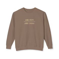 a brown sweatshirt with the words half mom, half coffee on it's chest