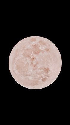 the full moon is seen in the dark sky