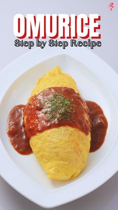 an omurce on a plate with sauce and ketchup