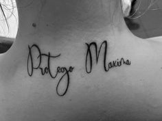 a woman's back neck with the words pat go mama written in cursive font