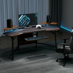 a computer desk with a monitor and keyboard on it