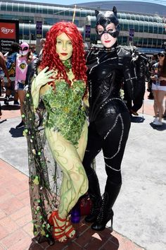 two people in costumes posing for a photo