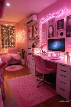 a bedroom with pink lights and pictures on the wall above the desk, along with a bed