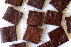 chocolate brownies cut into squares on a cutting board