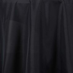 a black table cloth with white trim on it