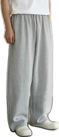 Oversized Sportswear Bottoms For Loungewear, Wide Leg Sportswear Joggers, Winter Full Length Bottoms For Leisure, Stretch Solid Color Sweatpants, Full Length Bottoms For Leisure In Winter, Solid Color Full Length Pants For Loungewear, Casual Solid Color Baggy Sweats, Solid Color Full Length Loungewear Pants, Full Length Solid Color Pants For Loungewear