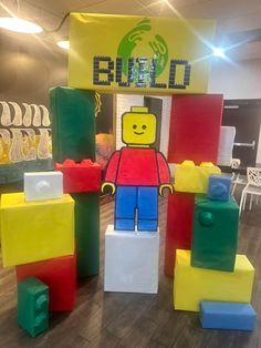 the lego store has been decorated with colorful blocks and bricks for display on the floor