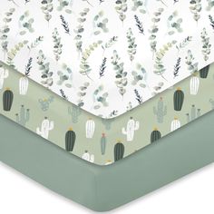 an image of a baby crib bedding set with cactus print