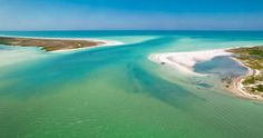 an aerial view of the water and sand dunes at white island national park, florida