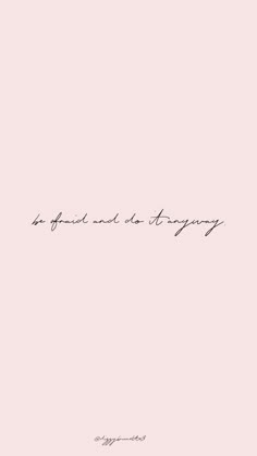 the words are written in cursive writing on a pale pink background with black ink