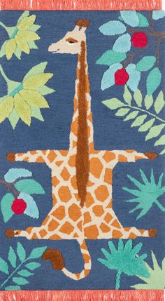 a blue rug with a giraffe on it's face and leaves around the neck