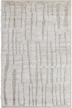 a white rug with lines on it