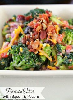 broccoli salad with bacon and pecans in a white bowl on a table