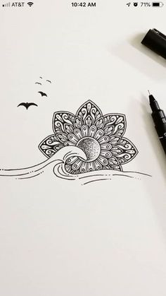 a drawing of a flower with birds in the background and an ink pen next to it