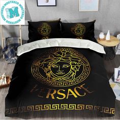 a black and gold bed cover with an image of a man's face on it