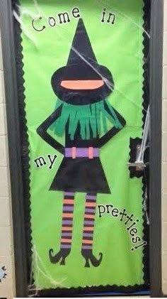 a door decorated with an image of a witch and the words come in my prettiies