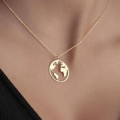 Charming World Map Necklace Embrace your wanderlust with our exquisite world map necklace. This minimalist piece features a delicate world map charm, perfect for adventurers and travel enthusiasts alike. Crafted with attention to detail, this world jewelry serves as a beautiful reminder of your journeys and the places you've explored. Whether you wear it as a statement piece or a subtle accessory, it adds a touch of elegance to any outfit. Celebrate your love for travel and connect with the world around you with this stunning world map necklace--an ideal gift for yourself or a fellow explorer!  PRODUCT HIGHLIGHTS  Our turquoise jewelry for women is crafted from high quality 925 Sterling Silver or 14K Solid Gold This  can be personalized with your or your loved ones names. Please contact us World Map Necklace, Map Necklace, Minimalist Necklace, Jewelry Silver, Birthday Present, Turquoise Jewelry, World Map, Ideal Gift, Necklace Etsy