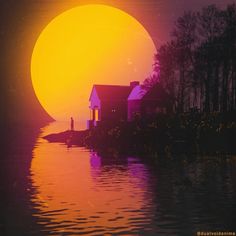 the sun is setting behind a house by the water's edge with a person standing in front of it