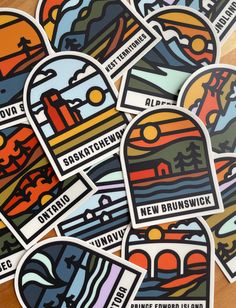 several stickers with different colors and designs on them, all depicting the name of new brunswick