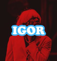 a man in a red suit holding his hand up to his face with the word igor on it