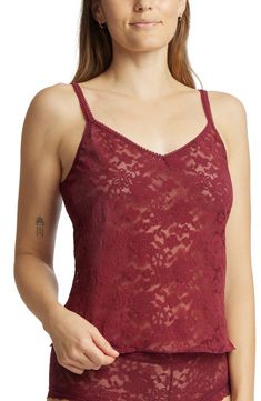 Channel sheer romance in this lacy cami with a soft lettuce-edge hem. V-neck Elasticized straps Sheer 85% nylon, 15% spandex Hand wash, dry flat Imported Lace Stretch Camisole Tank Top, Stretch Lace Camisole Tank Top, Stretch Lace Cami Tank Top, Stretch Sleeveless Camisole With Delicate Lace, Delicate Lace Tank Camisole, Lace Camisole With Straps, Sleeveless, Stretch Delicate Lace Camisole, Lace Cami Tank Top With Adjustable Straps, Stretch Lace Camisole