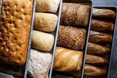 different types of breads and pastries in trays