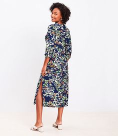 This beautifully streamlined fluid woven midi dress gets tied up at front with effortless glam. V-neck. Long blouson sleeves with puff shoulders and elasticized cuffs. Tie waist. Side slit. Back zip.,Hit:Hit: Midi - Hits at mid-calf,Imported:Imported,Fit:Fit: Waisted - fits and flatters waist,Length:49 1/4" from top back neck to hem, measured from a size 8/M,Fabrication:90% Rayon 10% Nylon,Garment Care:Machine Washable Loft Leafed Tie Front Midi Dress Size 0 Deep Space Blue Women's by Loft Size Petite Midi Dress, Petite Curvy, Tie Front Dress, Petite Shorts, Petite Shirts, Exclusive Clothing, Petite Jacket, Petite Pants, Dress Home