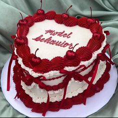 a heart - shaped cake with the words model marriage written on it is sitting on a white plate