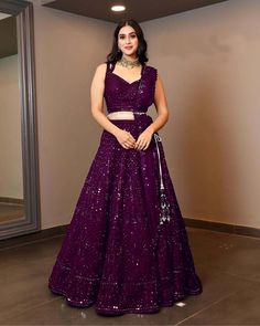 Wine Colour Designer Saree, Purple Reception Lehenga, Grape Wine Color Lehenga, Blouse And Lehenga Designs, Sequence Lehanga Design, Sequence Lehenga Designs, Designer Choli For Wedding, Wine Colour Lehenga Color Combos, Heavy Lehenga Designs