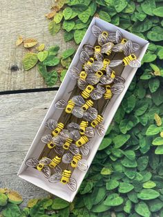 PRICES MAY VARY. Pack of 24 bees in a box Realistic looks Made of foam and wire Ideal for floral arrangements and all kinds of craft projects Very lightweight Perfect for DIY cake topper or hair & hat accessories Color: Yellow 2.2cm long x 1.2cm wide 4.5cm wide with opening wings unit count: 24.0 Cute and realistic.  Package: 24 bees  Measurements:    Bee body: 2.2cm long x 1.2cm wide  With opening wings: 4.5 cm wide  Eeach wingspan: 1.75cm x 1.5 cm   These artificial yellow bumble bees are grea Making Hair Accessories, Rainbow Bouquet, Honey Bee Decor, Butterfly Embellishment, Floral Picks, Bumble Bees, Orange Butterfly, Making Hair, Bee Crafts