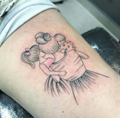 a woman with a tattoo on her arm hugging another woman