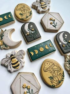 decorated cookies are arranged in the shape of hexagons and honeybees