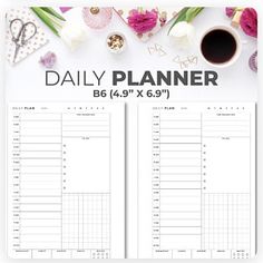 the daily planner is shown on top of a table with flowers and other things to do