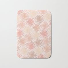 a pink and white flower pattern on a light colored background