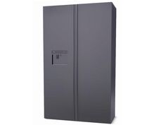 a tall gray refrigerator freezer sitting on top of a white wall