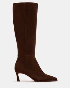 Elevate your style with LUCID - a sleek, knee-high boot featuring a trendy kitten heel and a pointed toe for a sophisticated touch. Perfect for pairing with any outfit, this boot will add a touch of elegance to your wardrobe. 2.25 inch heel height Size 6 measurements: 14.5 inch shaft circumference, 15.25 inch shaft height Size 8 measurements: 15.25 inch shaft circumference, 16.25 inch shaft height Size 10 measurements: 16 inch shaft circumference, 17.25 inch shaft height Suede upper material Tex Brown Heel Boots Outfit, Heels Boots Outfit, Pointy Boots, Brown Heeled Boots, Kitten Heel Boots, Brown Suede Boots, Heel Boot, Shoe Lover, Kitten Heel