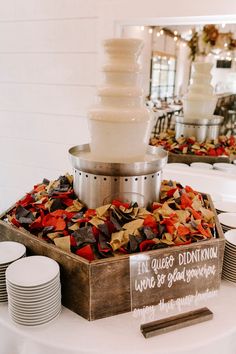 a table topped with plates and a cake