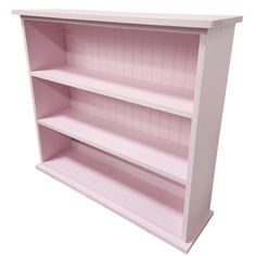 a pink bookcase with three shelves on each side and one shelf above the other