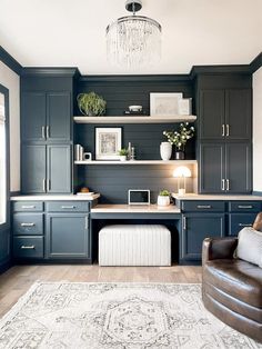 a living room filled with furniture and a rug