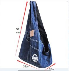 an image of a denim bag with measurements