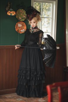 This Edwardian Style Gothic Long Dress is perfect for those looking to make a statement. It is made from a luxurious velvet fabric and adorned with beautiful Victorian lace detailing. The dress features a high neckline with a keyhole cut-out and a long flowy skirt. The full length silhouette and the intricate details make this a unique and timeless piece. The dress is perfect for any special occasion, whether it's a formal event or a night at the opera. The Edwardian Style Gothic Long Dress is a Flowy Goth Dress, Gothic Edwardian Fashion, Gothic Long Dress, Dnd Fashion, Lace Dress Plus Size, Pretty Poses, Polka Dot Wedding Dress, Victorian Lace Dress, Gothic Victorian Dresses