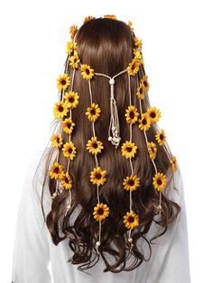 the back of a woman's head with sunflowers attached to it