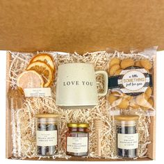 tea-gift-basket-with-mug-sand-and-sea-by-ashley Gift Basket Small Business, Mini Gift Basket Ideas, Homestead Gift Basket, Tea Basket Gift Ideas, Tea Cup Gift Basket, Thrifted Gift Basket, Coffee Basket Gift Ideas, Diy Tea Set, Coffee Gift Basket Ideas