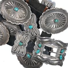 40's-50's Navajo stamped silver concho belt 44" total length, 3" x 2.5" buckle, (7) 2 3/8" x 1 3/8" Butterfly conchos, (6) 3" x 2 3/8" Conchos.   (14) total counting buckle.   All original with matching turquoise, buckle marked as shown.   All on a 15/16" leather belt.   459 grams total weight.  All precious metals are tested and guaranteed, any Native American jewelry referred to as Silver or Sterling is guaranteed to be a minimum of 90% (coin) silver and possibly higher content. Anything marke Silver Southwestern Concho Belt, Southwestern Silver Concho Belt, Traditional Silver Concho Belt, Traditional Adjustable Concho Belt, Southwestern Concho Belt Buckles For Ranch, Bohemian Concho Belt Buckles For Western-themed Events, Traditional Concho Belt Buckles For Western-themed Events, Southwestern Concho Belt For Western-themed Events, Adjustable Southwestern Concho Belt Buckles