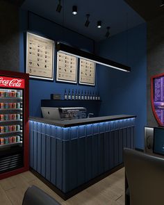 the interior of a restaurant with soda machines