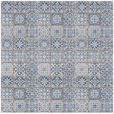 a blue and white tile pattern with an orange border